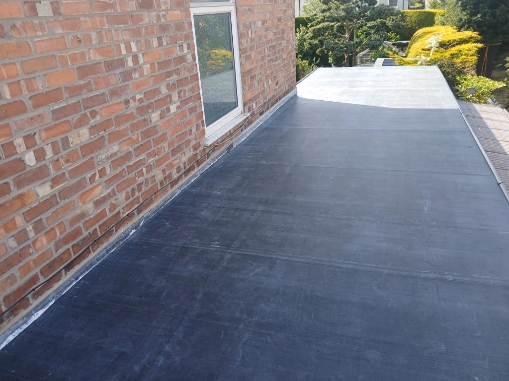 EPDM flat roof covering on a SIP roof panel build